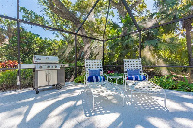 a view of a street with houses on the side