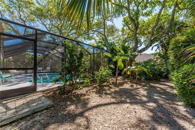 a backyard of a house with lots of green space