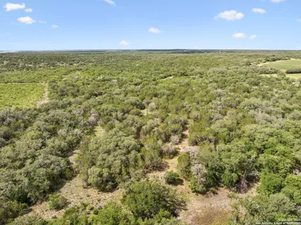 a view of an ocean and a mountain