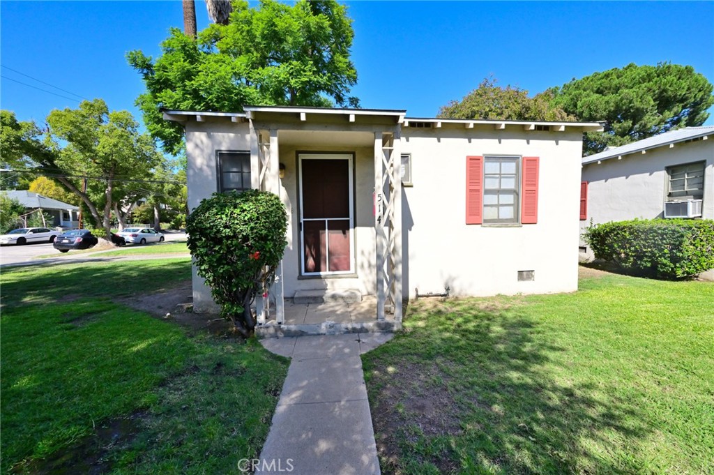 514 North Madison Avenue Pasadena, CA 91101 - Photo 11 of 29 a front view of a house with a yard