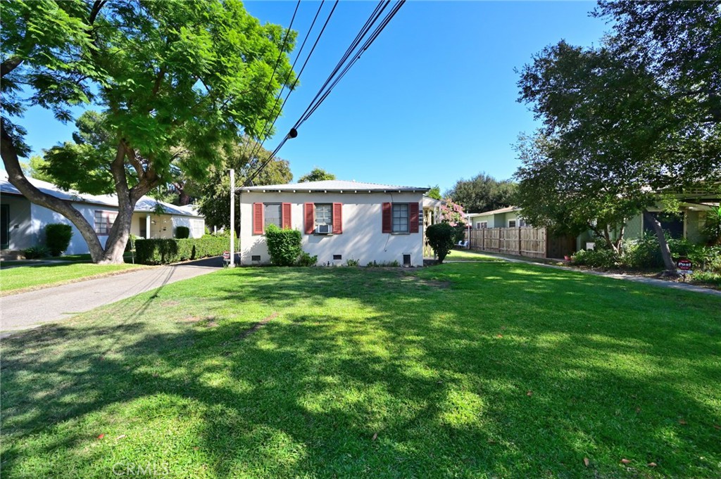 514 North Madison Avenue Pasadena, CA 91101 - Photo 18 of 29 a view of house with backyard and a tree