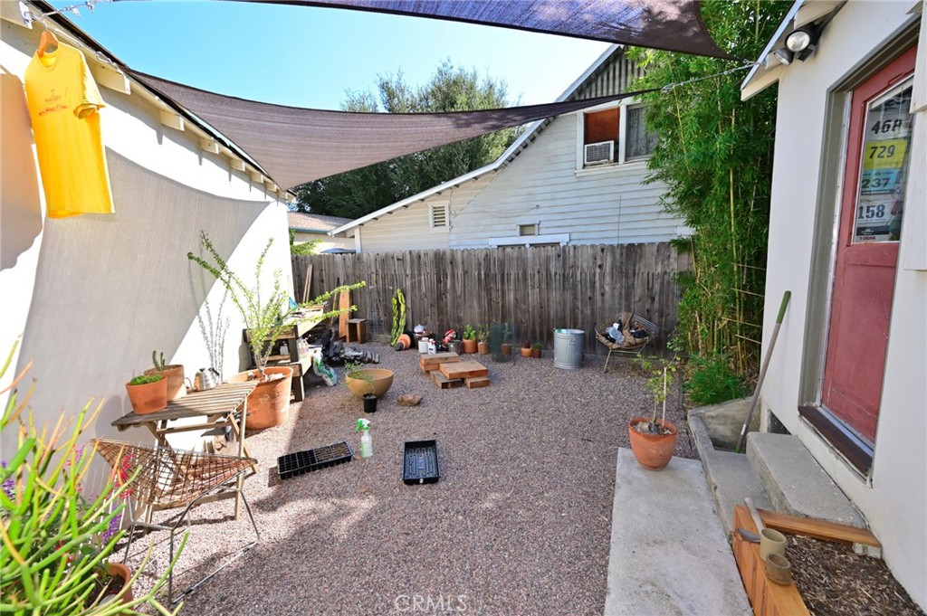 514 North Madison Avenue Pasadena, CA 91101 - Photo 22 of 29 a view of a patio with table and chairs and potted plants