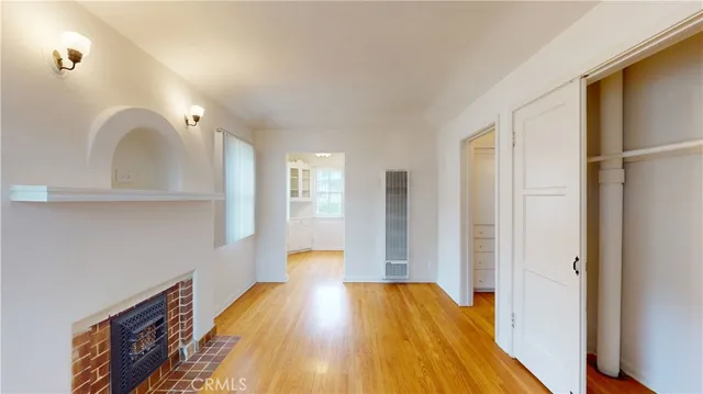 a bathroom with a bathtub and a window