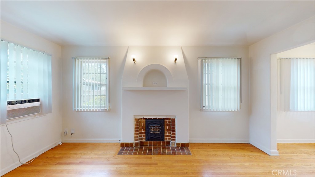 514 North Madison Avenue Pasadena, CA 91101 - Photo 24 of 29 a living room with fireplace furniture and a window