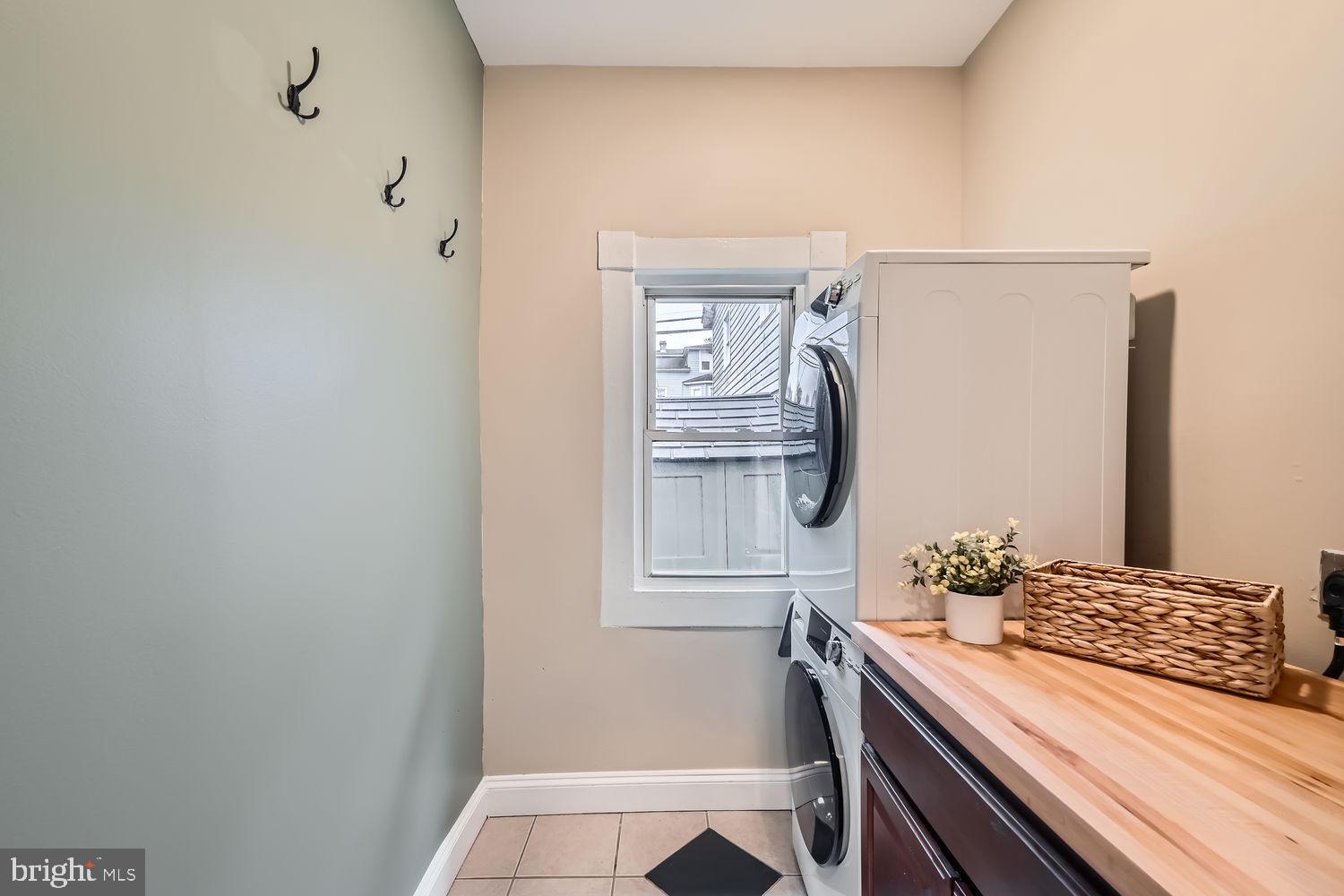 2415 Hammonds Ferry Road Halethorpe, MD 21227 - Photo 12 of 26 a bathroom with a granite countertop sink and a mirror
