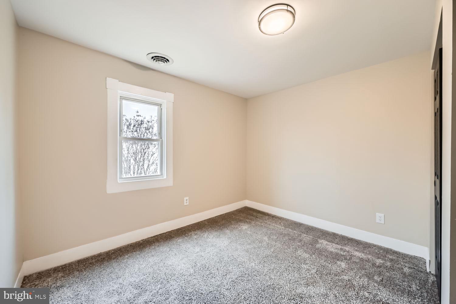 2415 Hammonds Ferry Road Halethorpe, MD 21227 - Photo 15 of 26 an empty room with a window