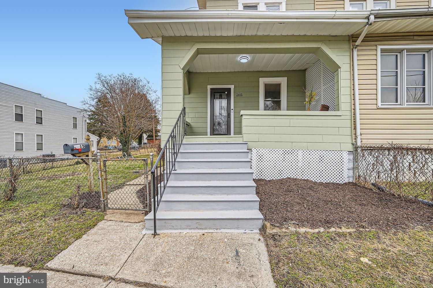 2415 Hammonds Ferry Road Halethorpe, MD 21227 - Photo 2 of 26 a view of a house with a small yard