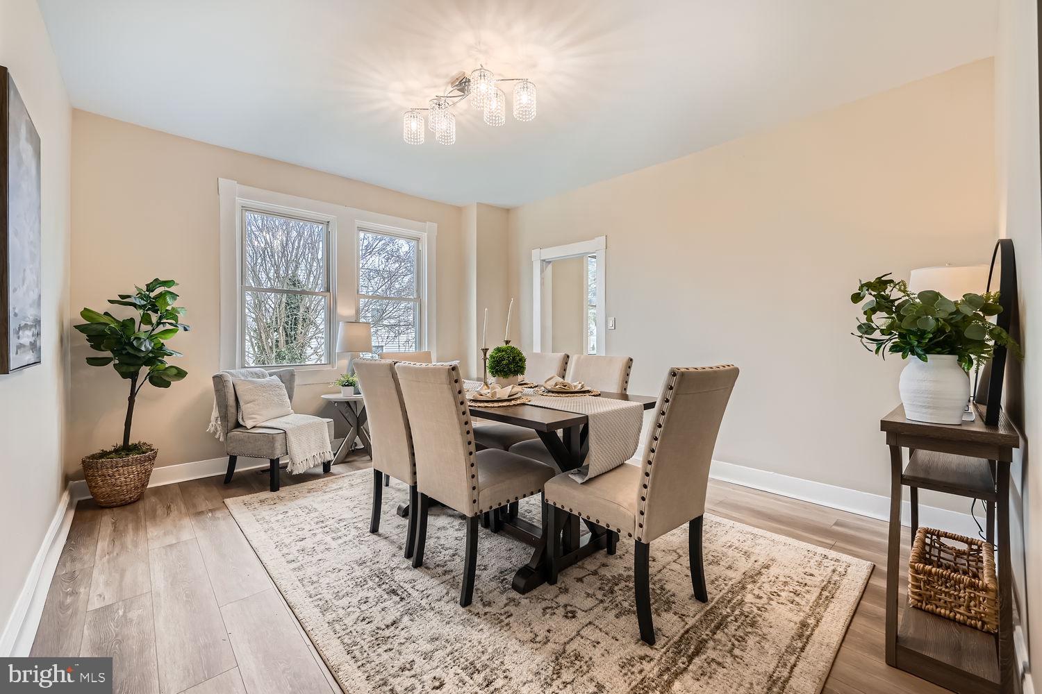 2415 Hammonds Ferry Road Halethorpe, MD 21227 - Photo 5 of 26 a view of a dining room with furniture window and wooden floor