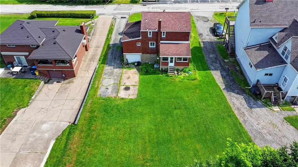1420 Homestead Road Verona, PA 15147 - Photo 32 of 34 an aerial view of a houses with a yard