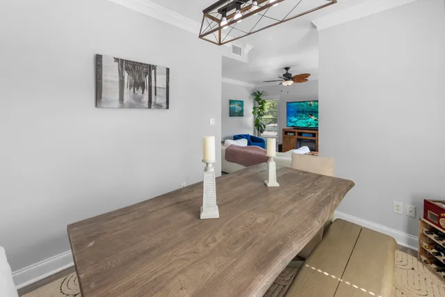 a room with wooden floor and furniture