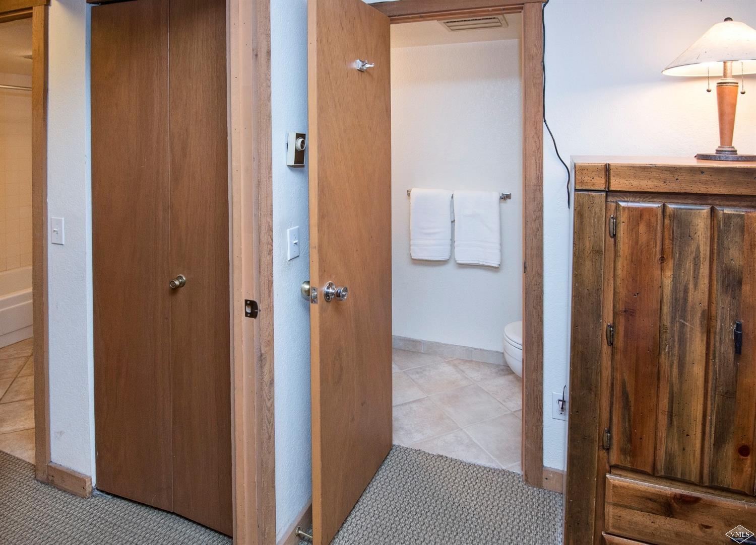 4570 Vail Racquet Club Drive, Unit 21 Vail, CO 81657 - Photo 12 of 16 a view of a bathroom from a hallway