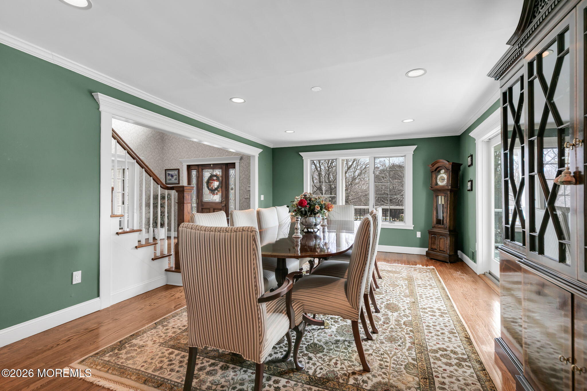 10 Paddock Lane Colts Neck, NJ 07722 - Photo 26 of 55 a dining room with furniture and a floor to ceiling window
