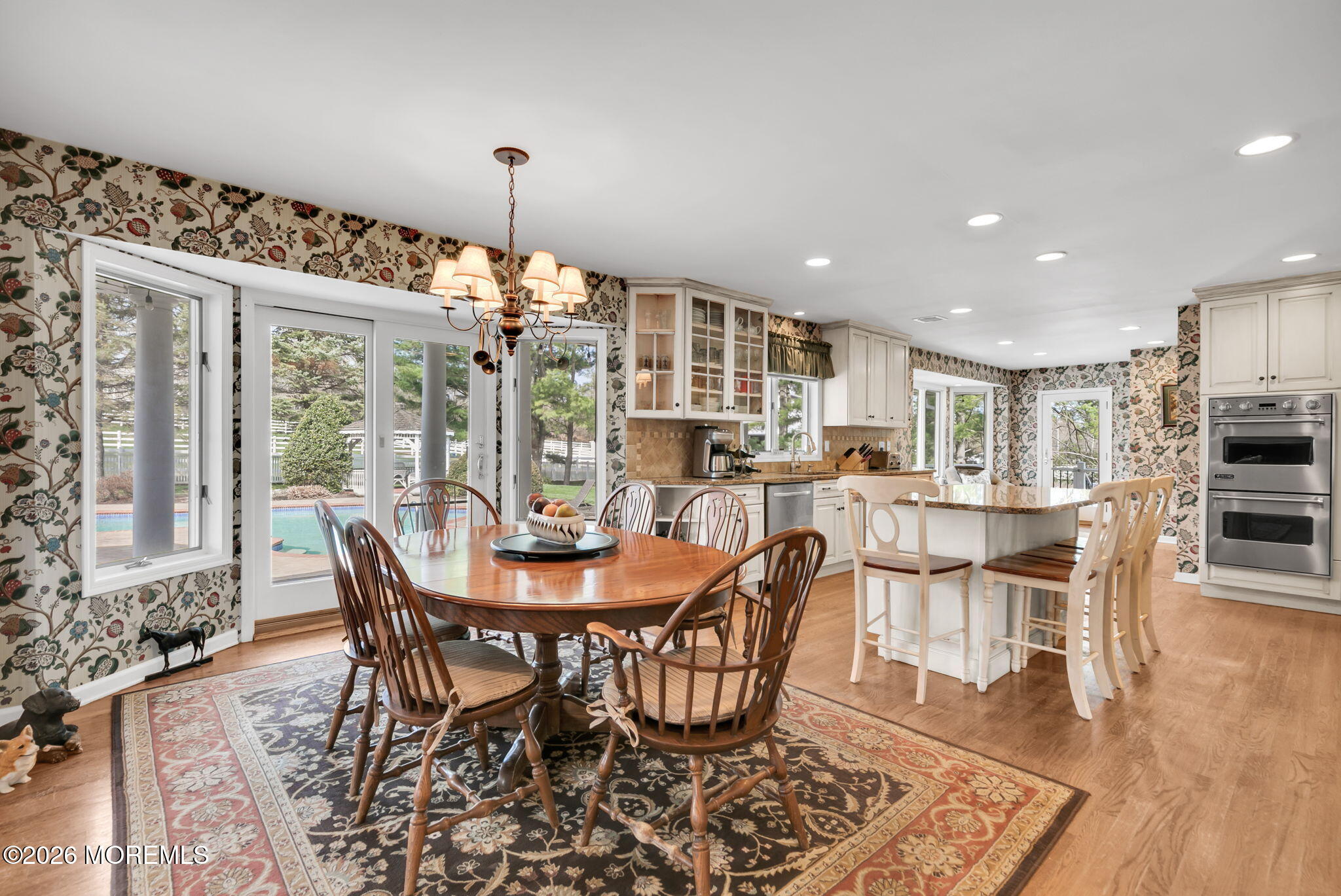 10 Paddock Lane Colts Neck, NJ 07722 - Photo 30 of 55 a dining room with furniture window and wooden floor