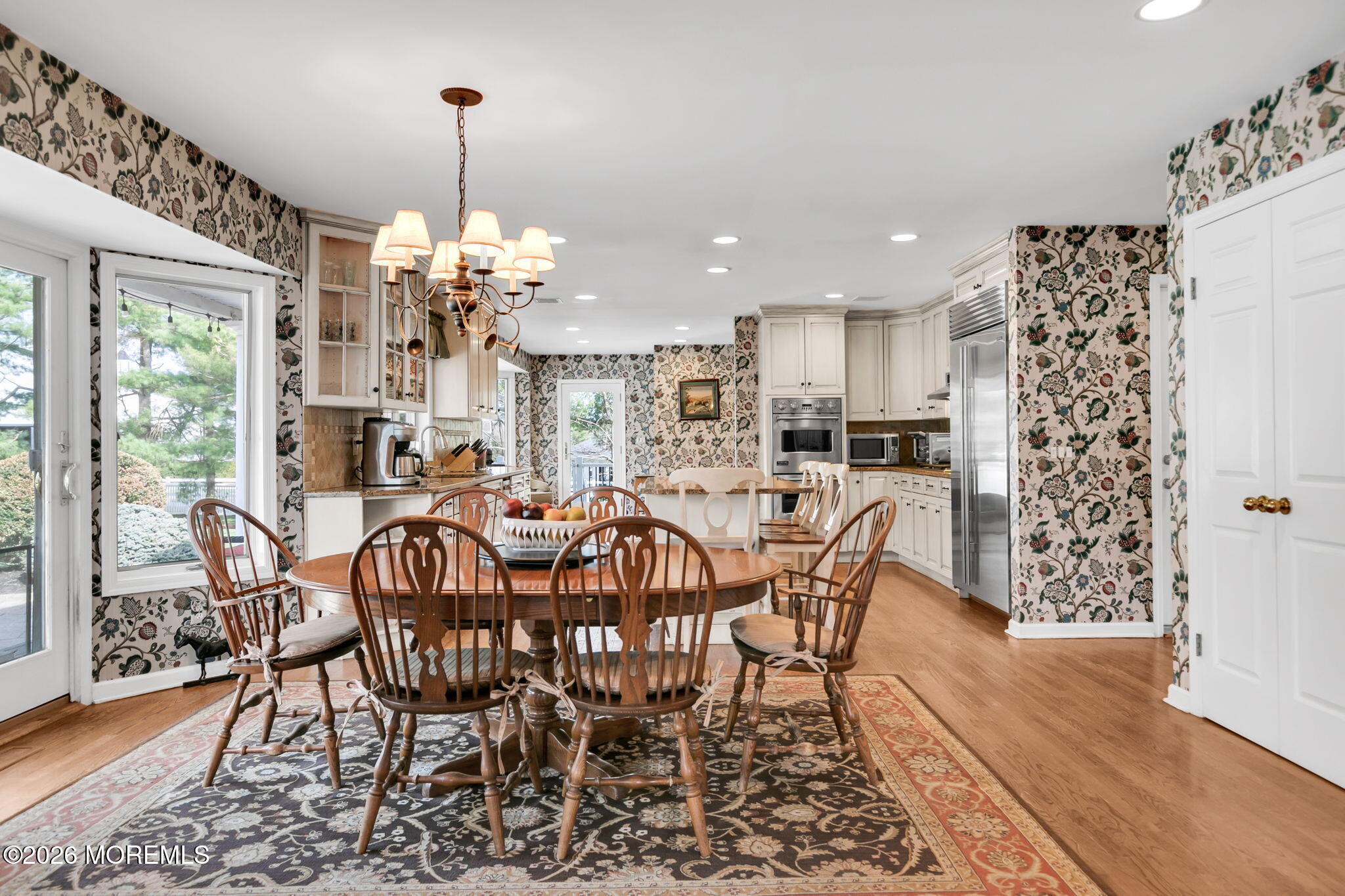 10 Paddock Lane Colts Neck, NJ 07722 - Photo 34 of 55 a view of a dining room with furniture window and wooden floor