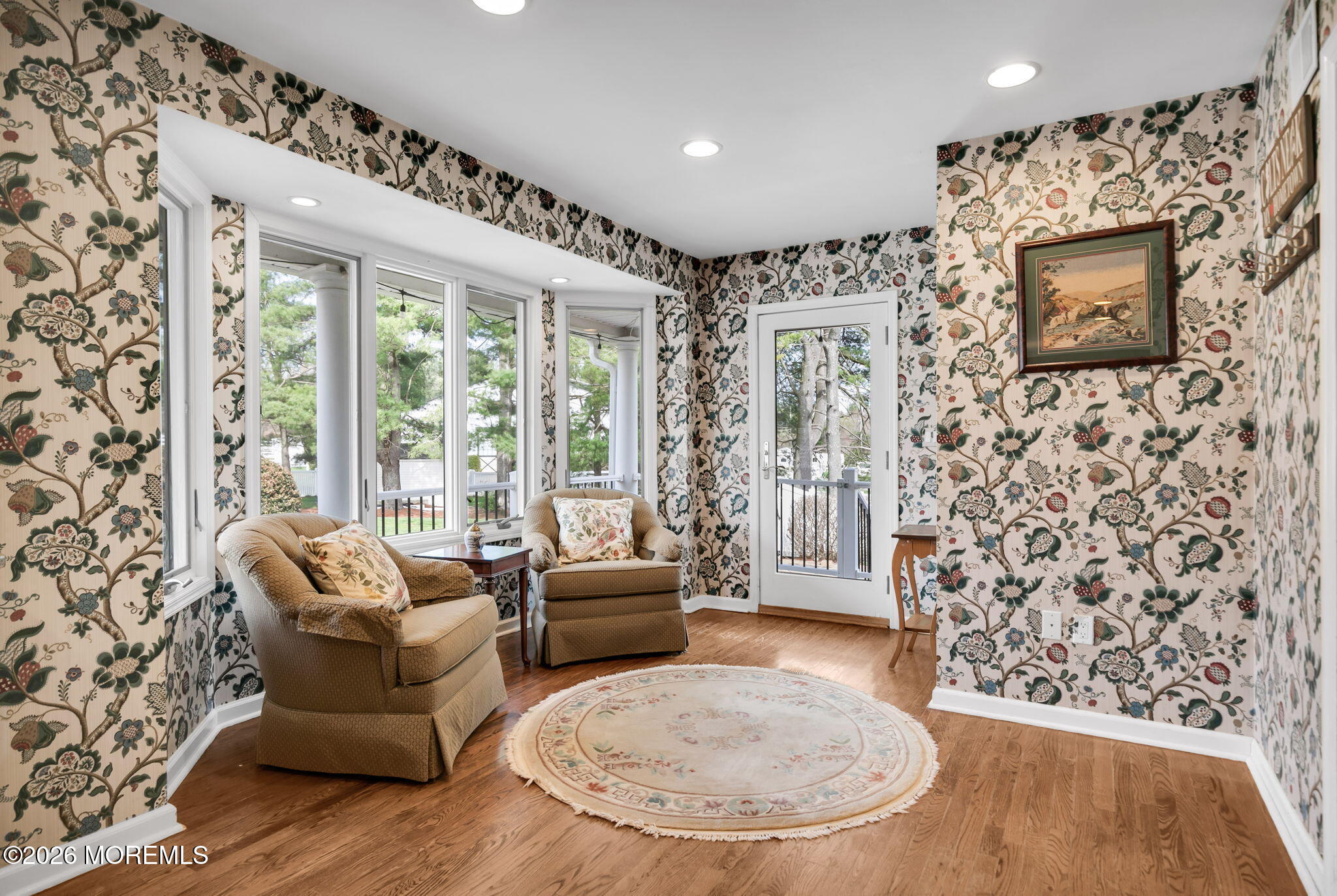 10 Paddock Lane Colts Neck, NJ 07722 - Photo 35 of 55 a living room with furniture and a large window