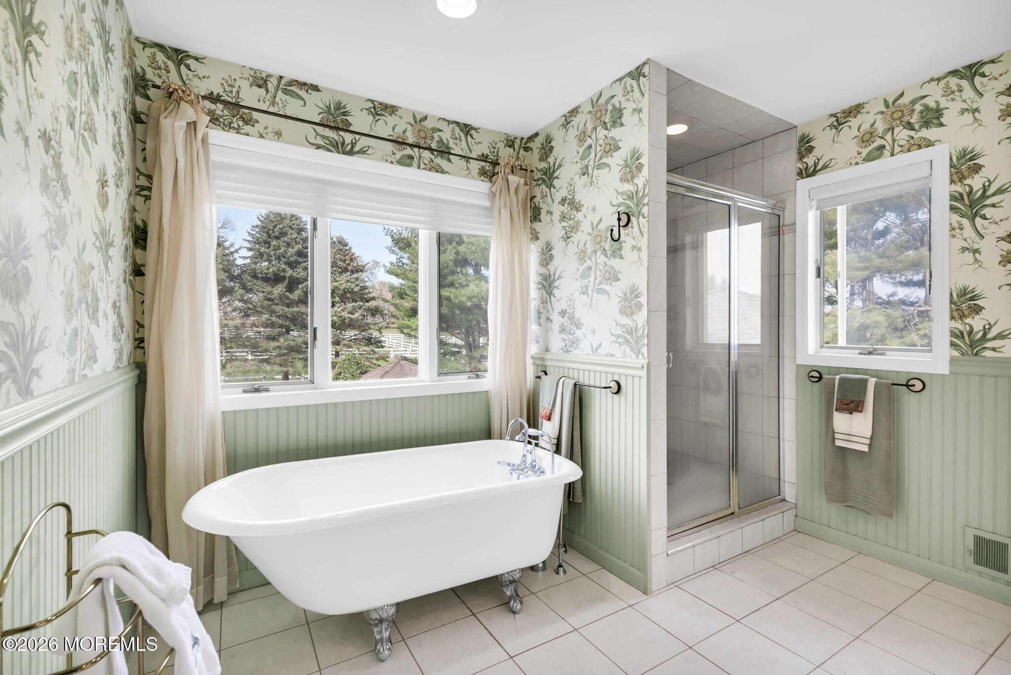 10 Paddock Lane Colts Neck, NJ 07722 - Photo 42 of 55 a spacious bathroom with a bathtub and shower