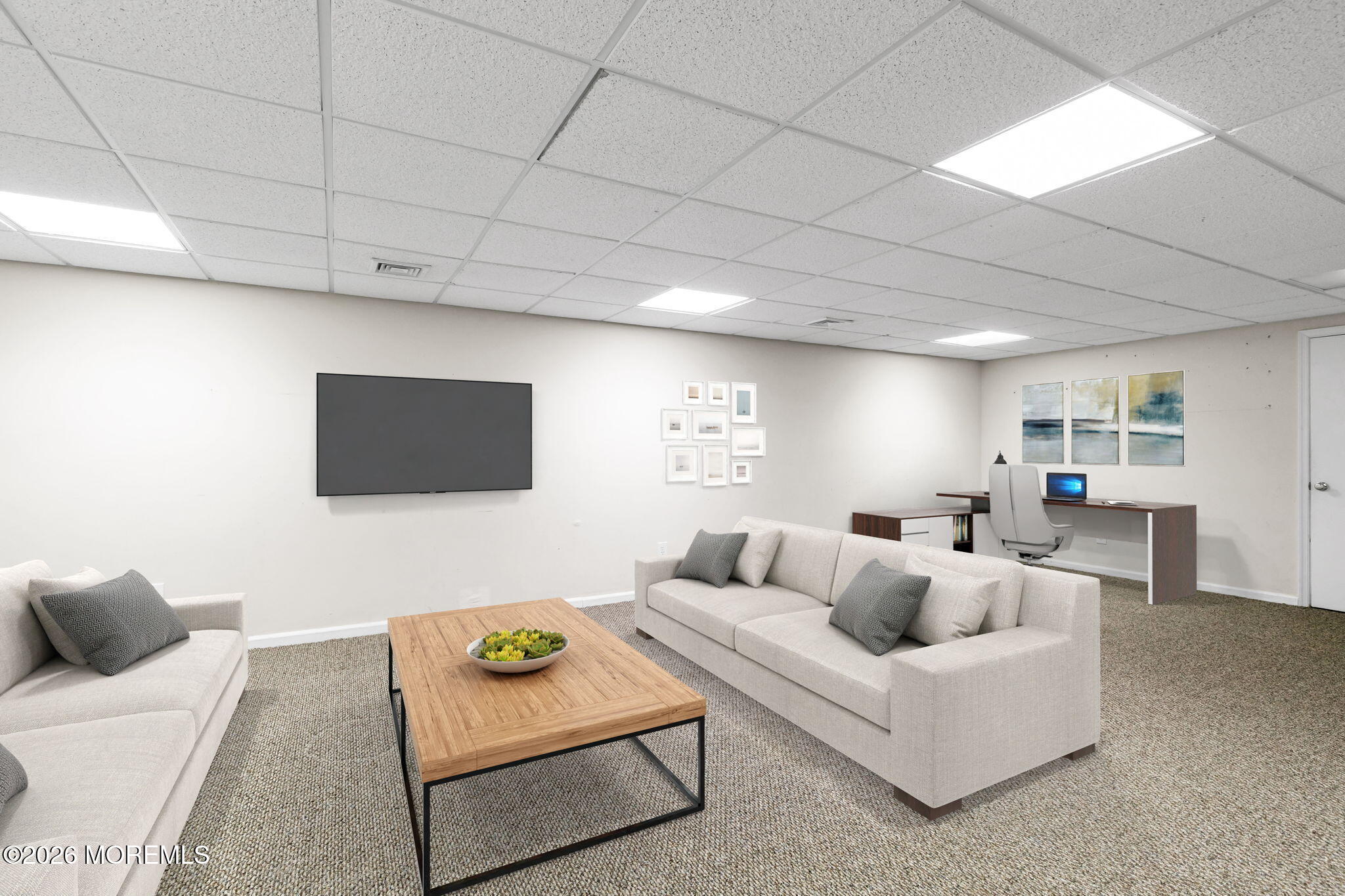 10 Paddock Lane Colts Neck, NJ 07722 - Photo 51 of 55 a living room with furniture and a flat screen tv