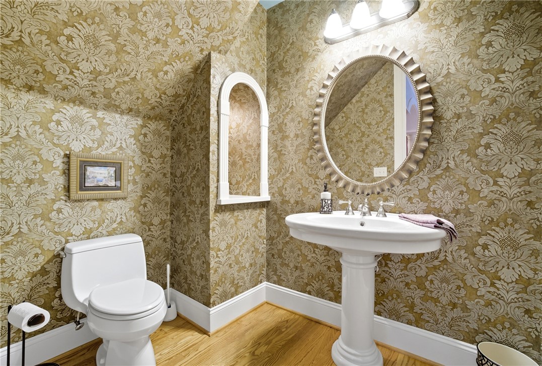 2328 Spindrift Road Virginia Beach, VA 23451 - Photo 28 of 50 Bathroom with wood finished floors and wallpapered walls