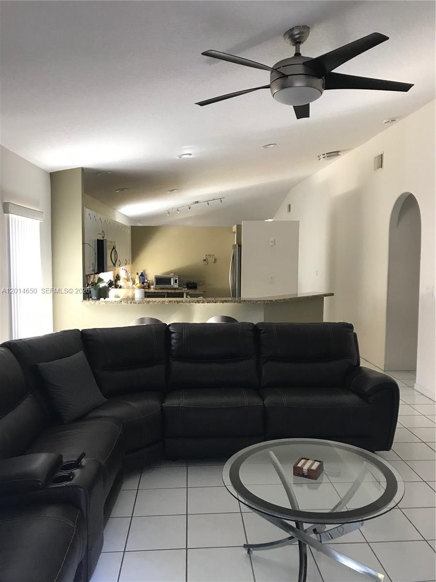 16654 Southwest 103rd Lane Miami, FL 33196 - Photo 8 of 20 a living room with furniture