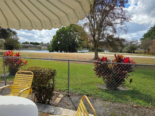 a view of a table and chairs in patio