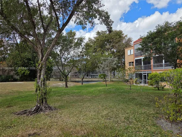 a view of a backyard with green space
