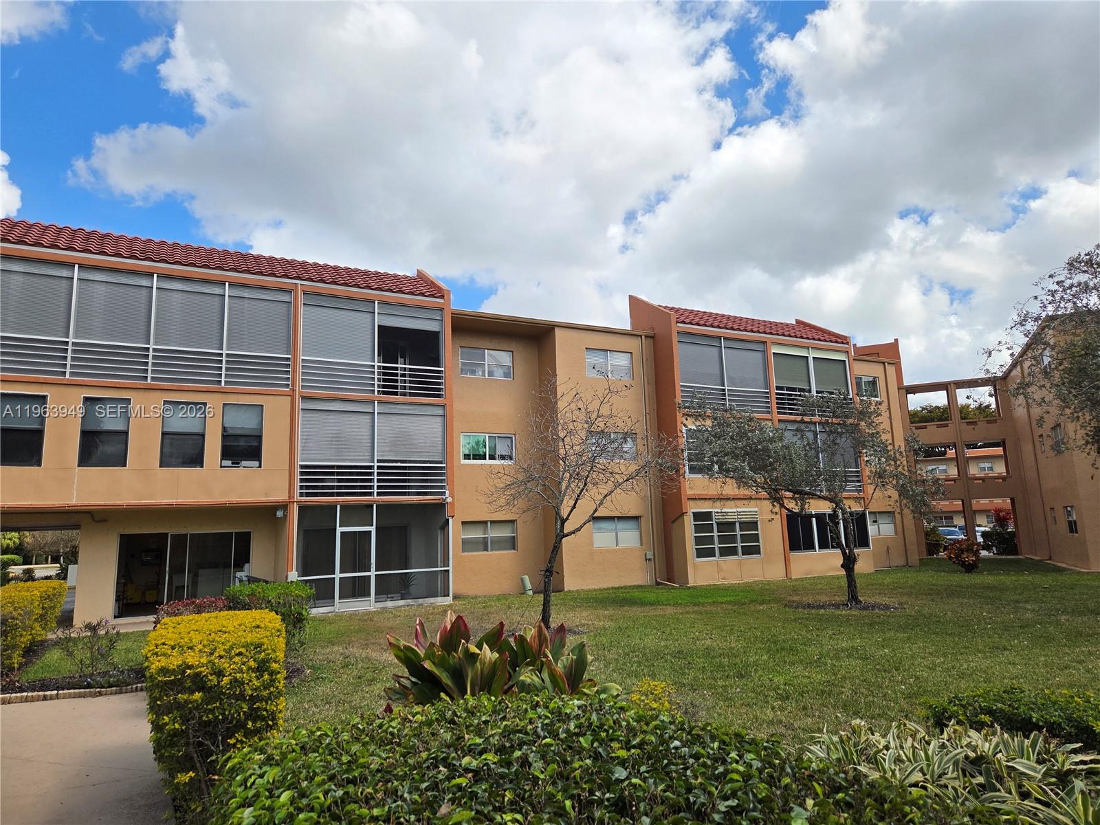8834 West McNab Road, Unit 201 Tamarac, FL 33321 - Photo 23 of 27 a view of a large building