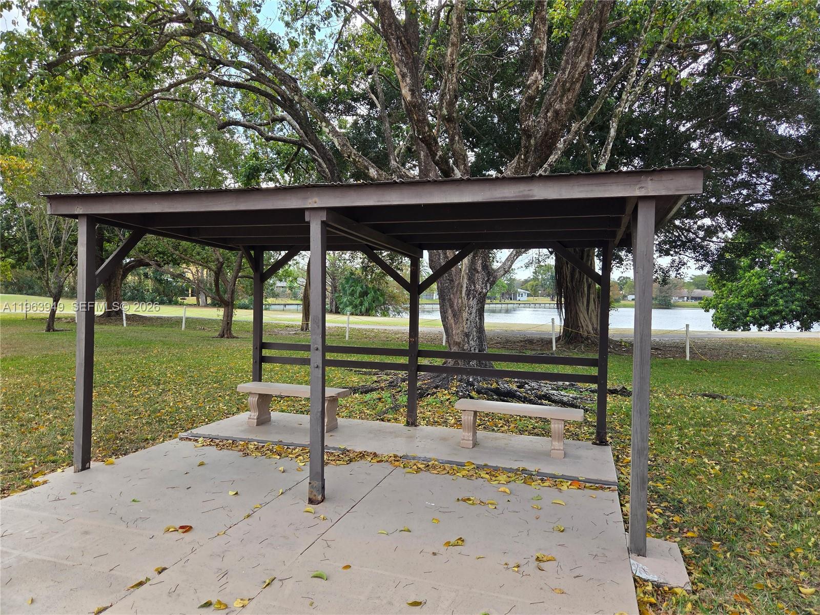 8834 West McNab Road, Unit 201 Tamarac, FL 33321 - Photo 24 of 27 a view of a porch with a backyard