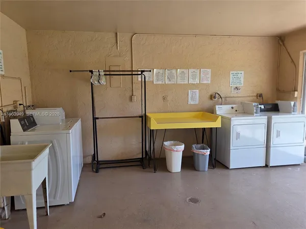 a bed room with a bed and a table