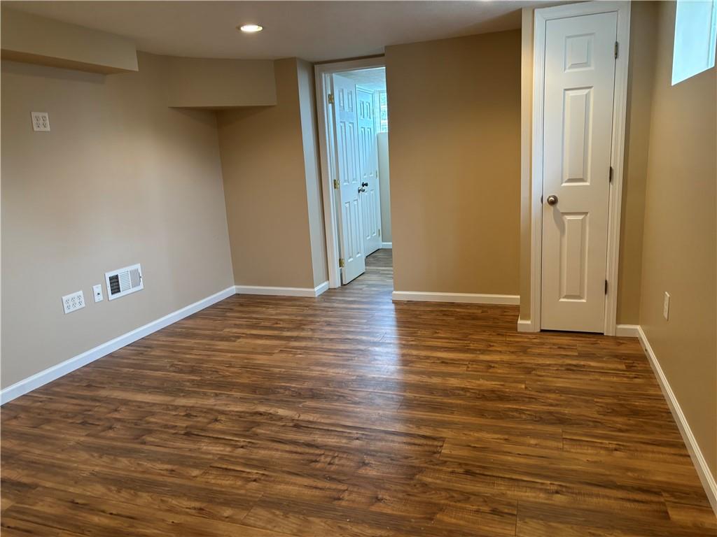 264 Hopwood Fairchance Road Uniontown, PA 15401 - Photo 7 of 19 a view of an empty room with wooden floor