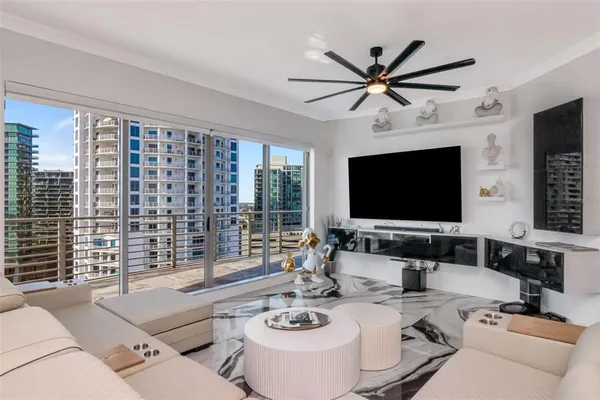 a kitchen with stainless steel appliances granite countertop a refrigerator and microwave
