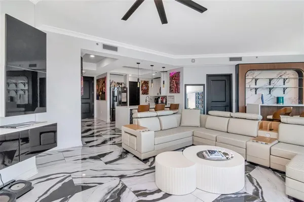 a kitchen with stainless steel appliances a stove refrigerator sink and microwave