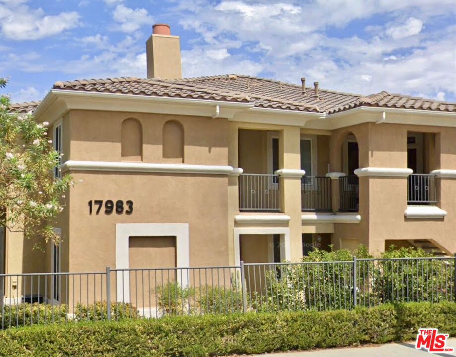 a front view of a multi story residential apartment building