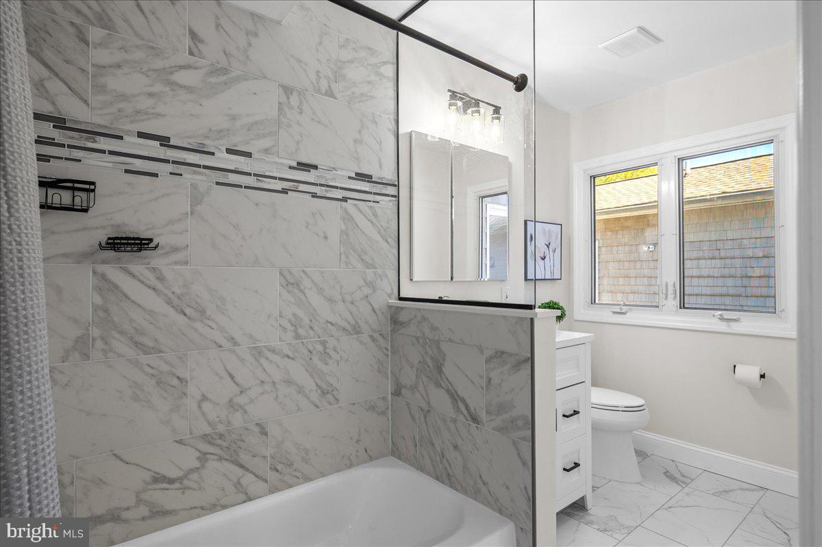 2011 Veale Road Wilmington, DE 19810 - Photo 19 of 43 The hall bath next to the living room