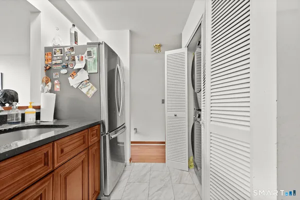 a view of a kitchen from the hallway