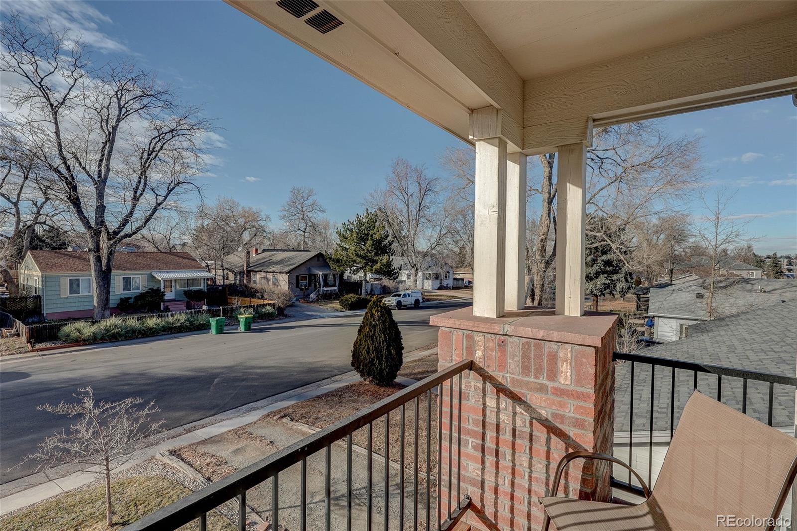 4792 South Acoma Street Englewood, CO 80110 - Photo 12 of 19 a view of a balcony with chairs