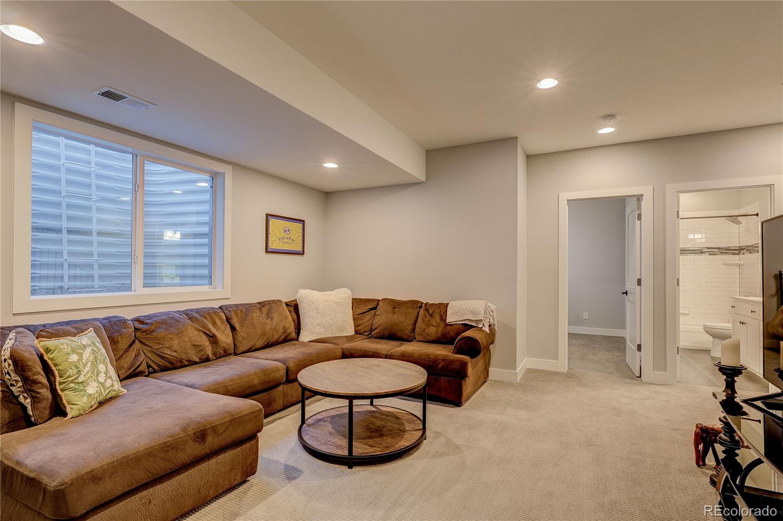 4792 South Acoma Street Englewood, CO 80110 - Photo 15 of 19 a living room with furniture and a couch
