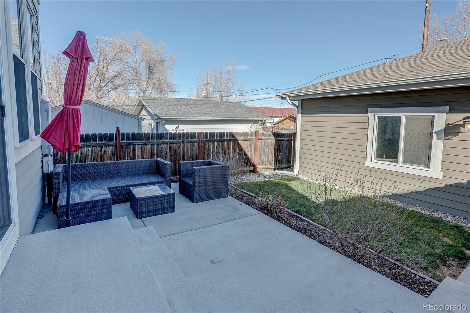4792 South Acoma Street Englewood, CO 80110 - Photo 19 of 19 a view of a house with patio