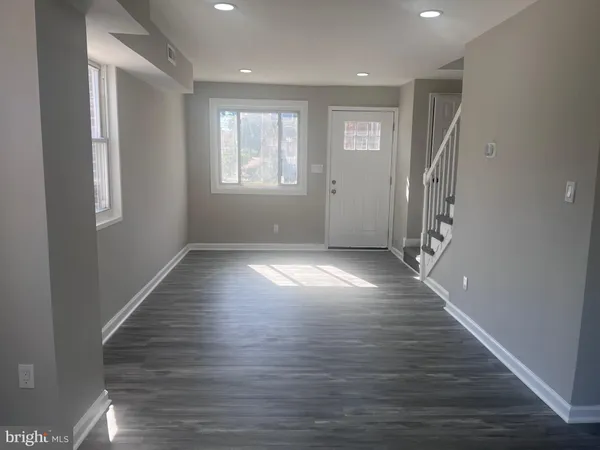 a view of livingroom with hardwood floor and window