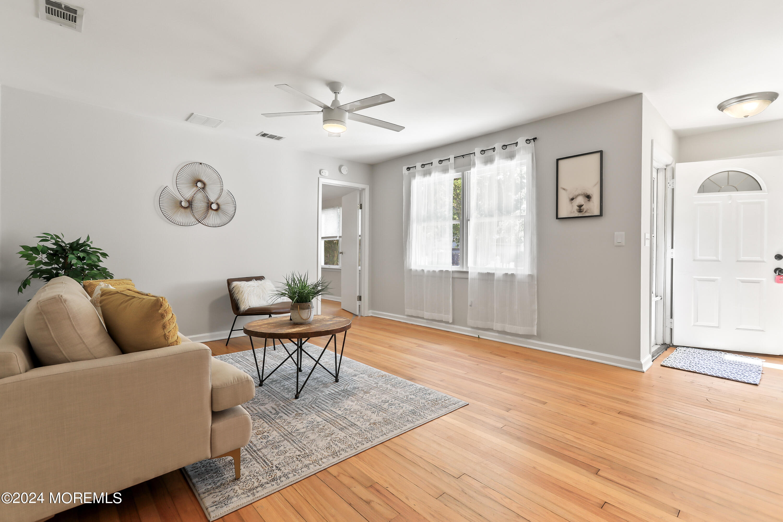 247 Timberline Road Toms River, NJ 08753 - Photo 5 of 23 a living room with furniture wooden floor and window