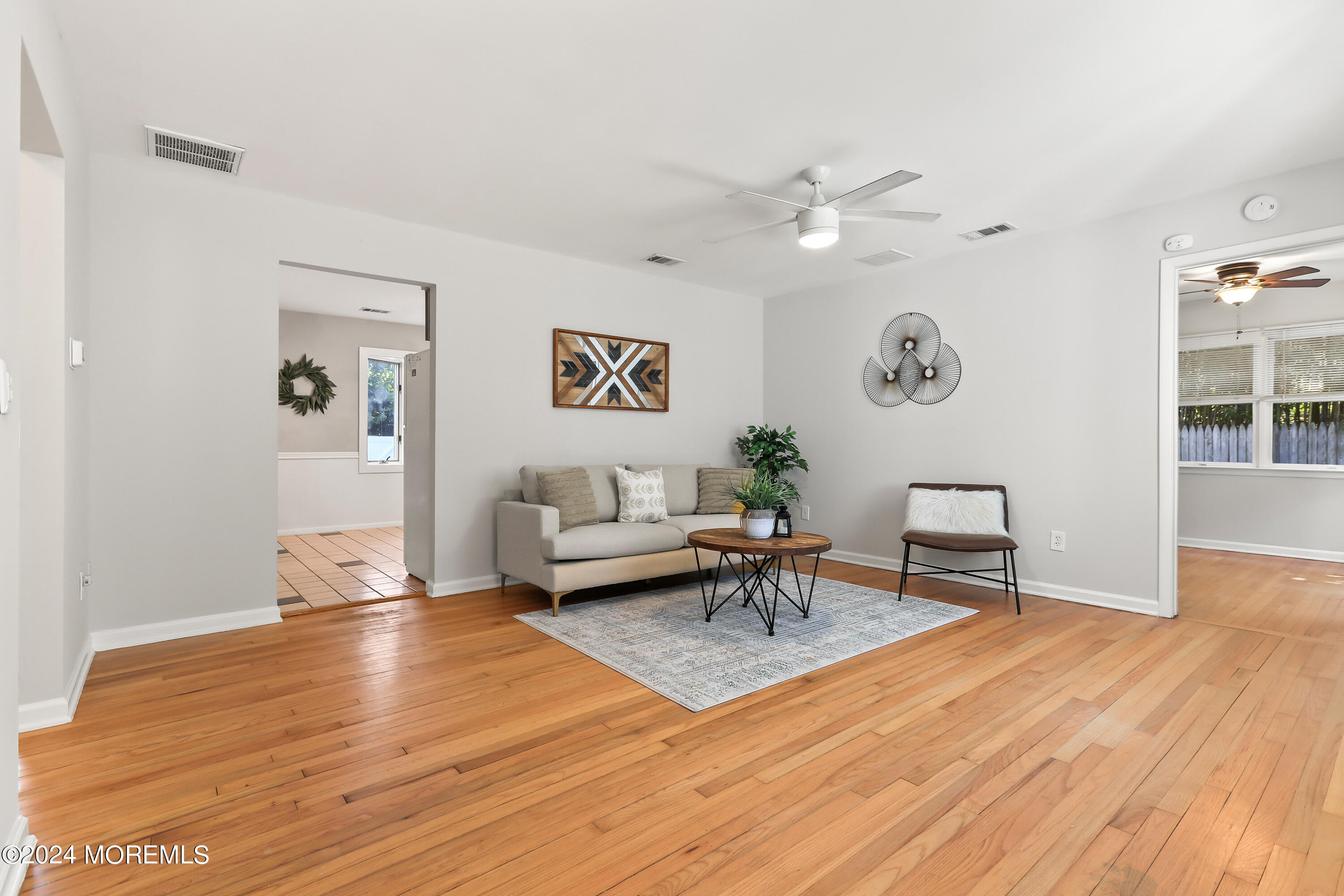 247 Timberline Road Toms River, NJ 08753 - Photo 7 of 23 a living room with furniture and wooden floor
