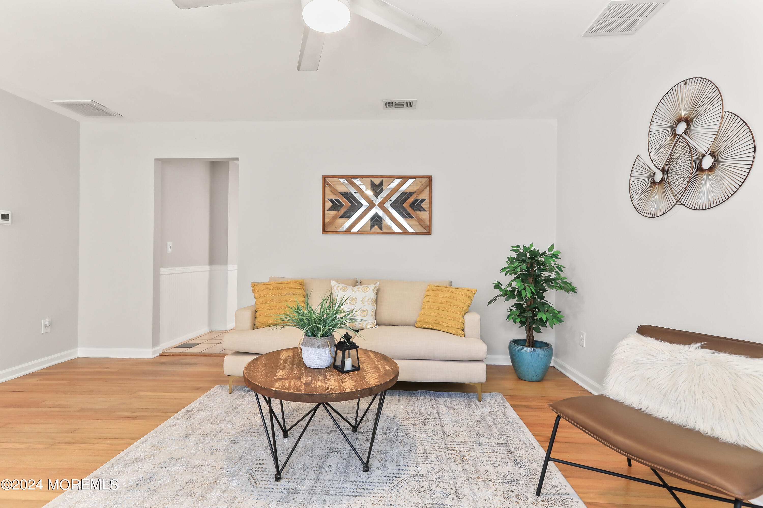 247 Timberline Road Toms River, NJ 08753 - Photo 8 of 23 a living room with furniture flowerpot and wooden floor