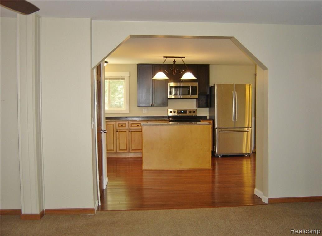4378 Chase Lake Road Howell, MI 48855 - Photo 13 of 19 Entrance off great room to kichen