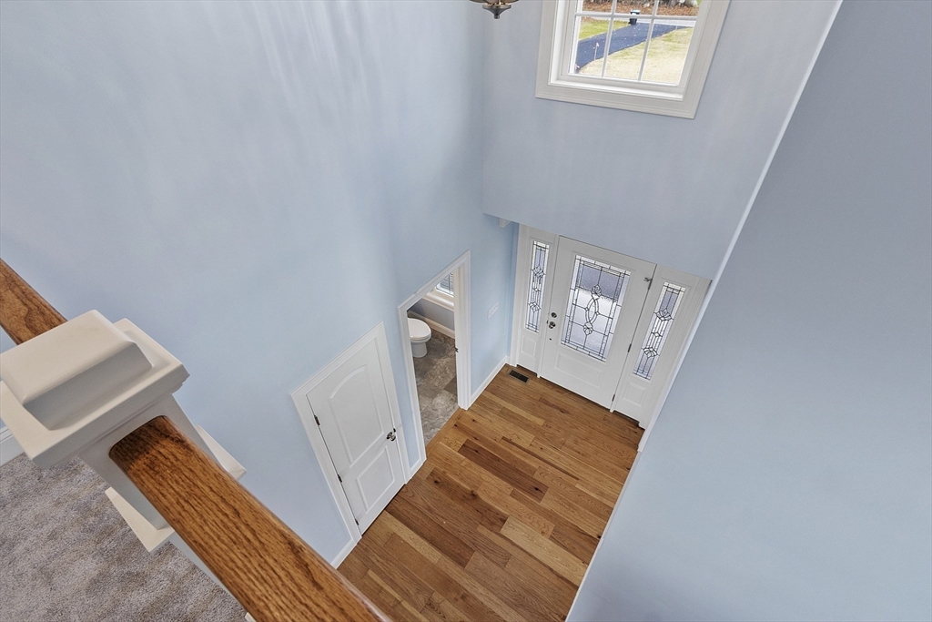 186 Justice Hill Road, Unit MOD FARM Sterling, MA 01564 - Photo 18 of 29 a view of a hardwood & door