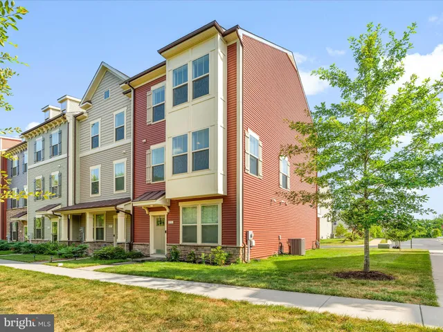 a front view of building with yard