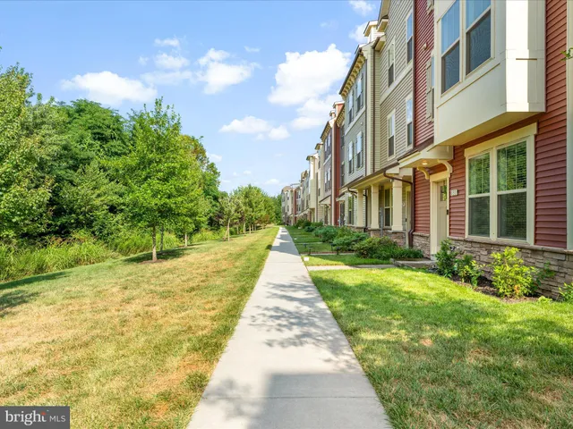 a view of an apartment with a garden
