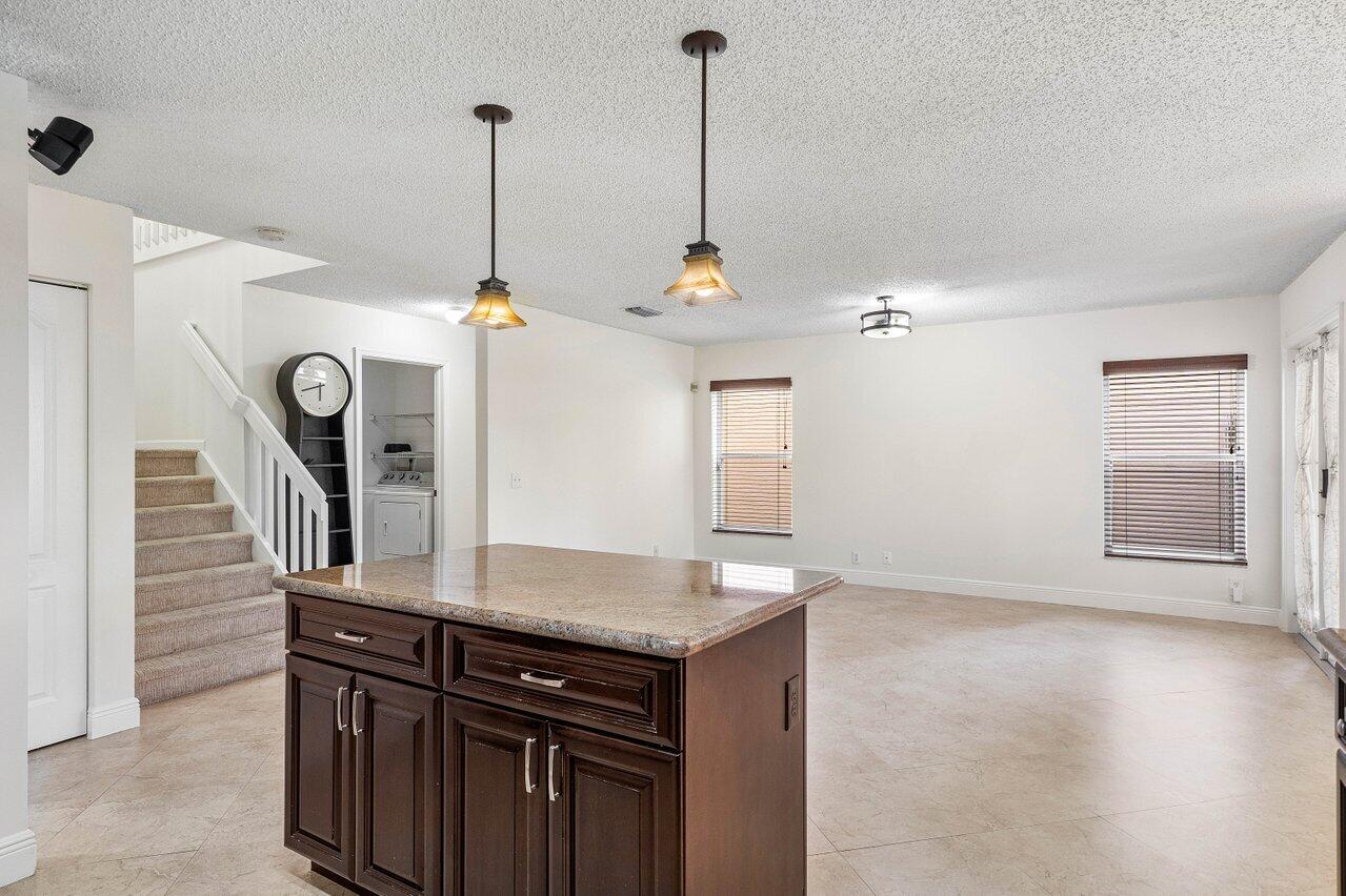 10934 Crescendo Circle Boca Raton, FL 33498 - Photo 14 of 59 Kitchen Island
