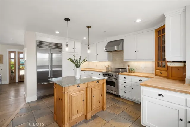 a bed room with a bed and a large window