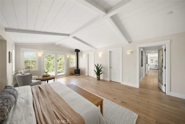 front view of a house with potted plants