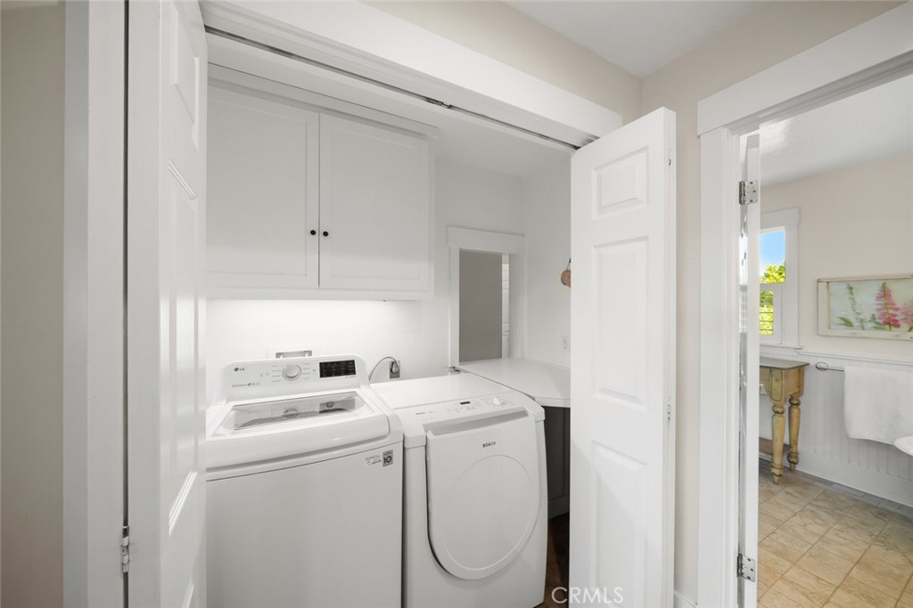 2650 Skyview Trail San Luis Obispo, CA 93405 - Photo 38 of 75 a view of washer and dryer with bathroom in the background