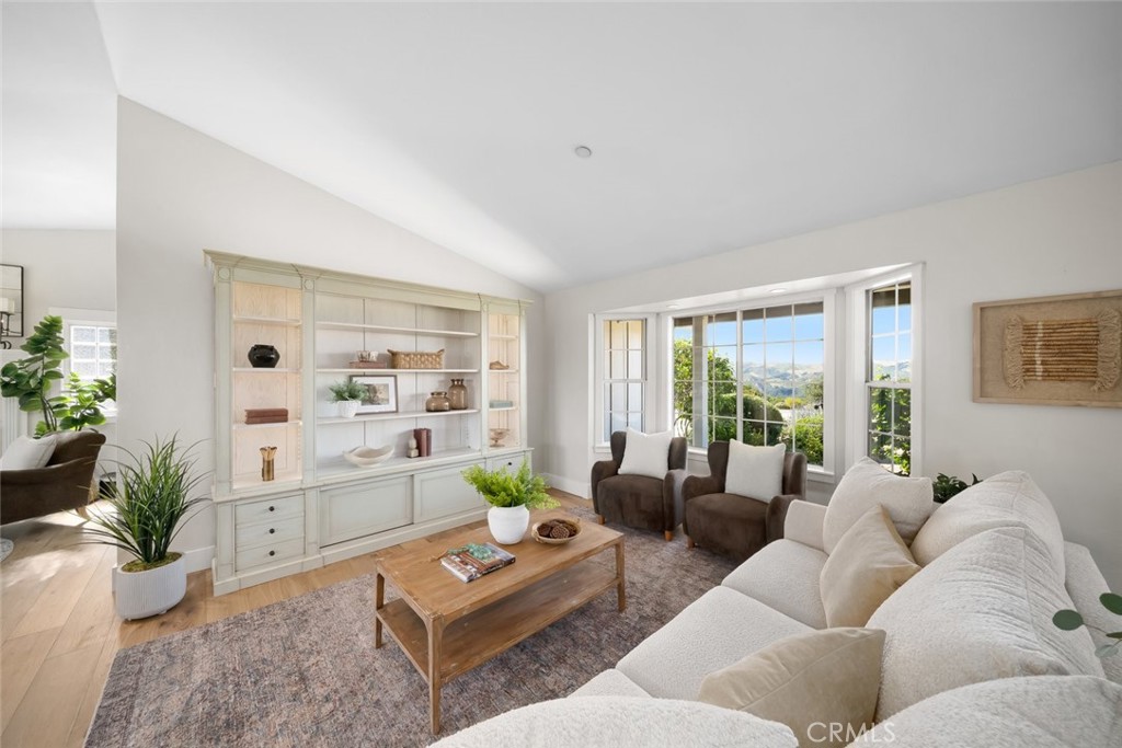 2650 Skyview Trail San Luis Obispo, CA 93405 - Photo 10 of 75 a living room with furniture and a potted plant